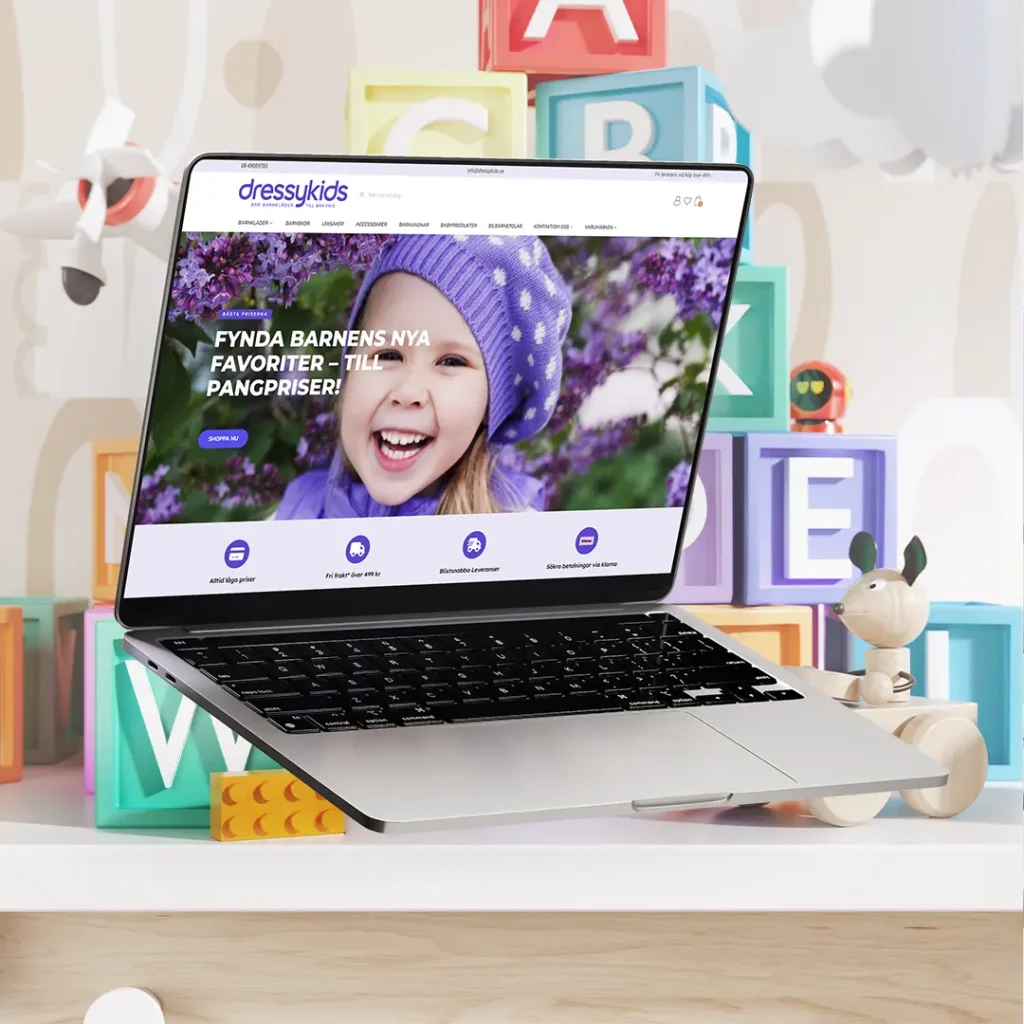 mockup på en laptop som visar hemsidan dressykids