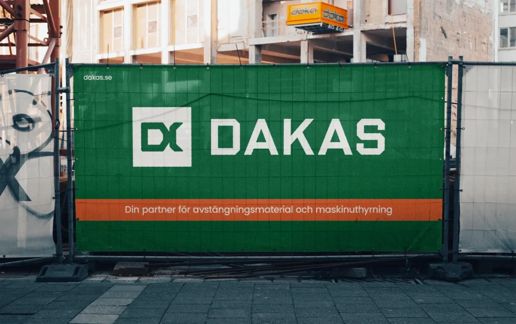 Avstängningsgaller med skynka med Dakas logotyp